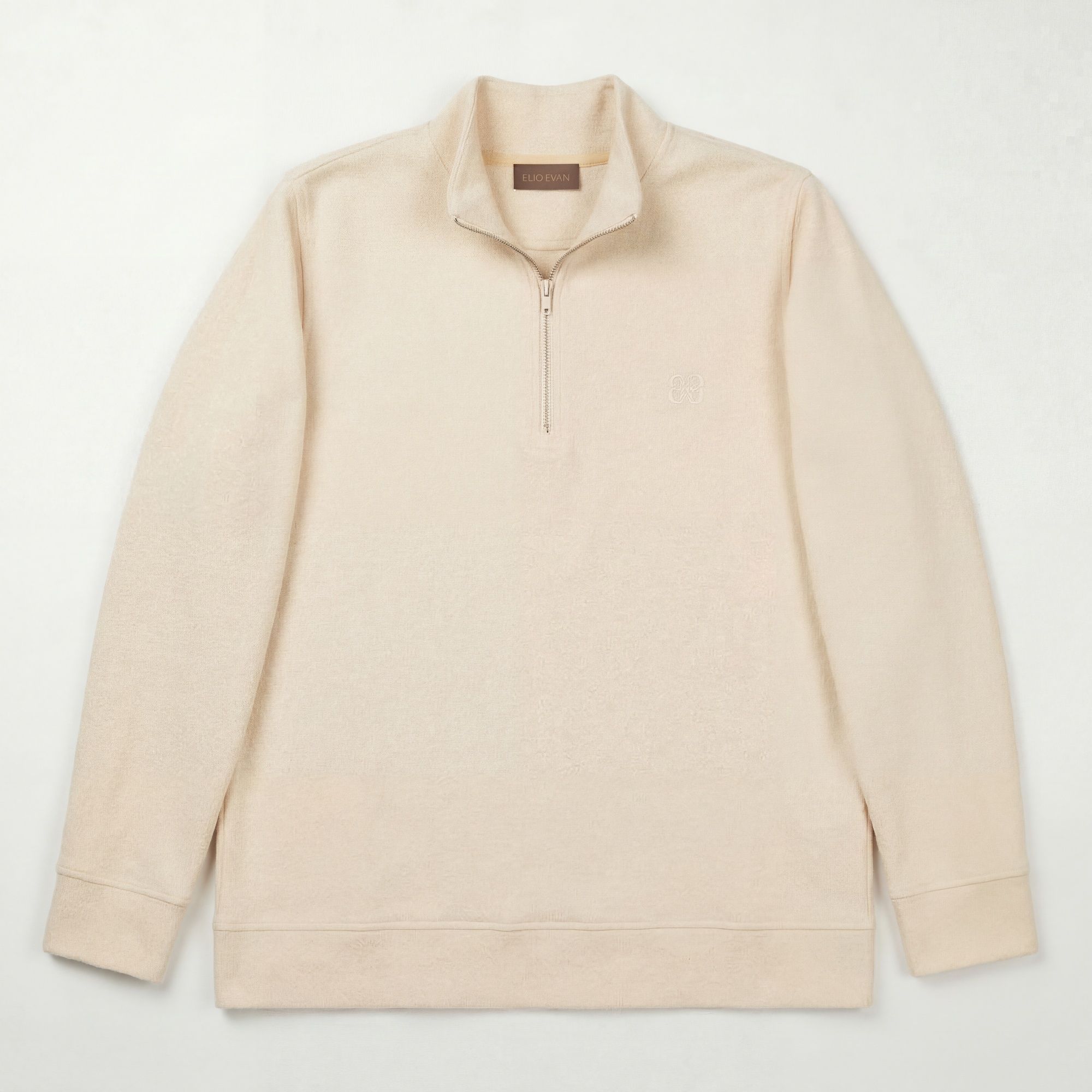 White mock zip sweater in a soft polyester-cotton blend. Relaxed fit, brushed finish, and clean smart-casual wear by Eli