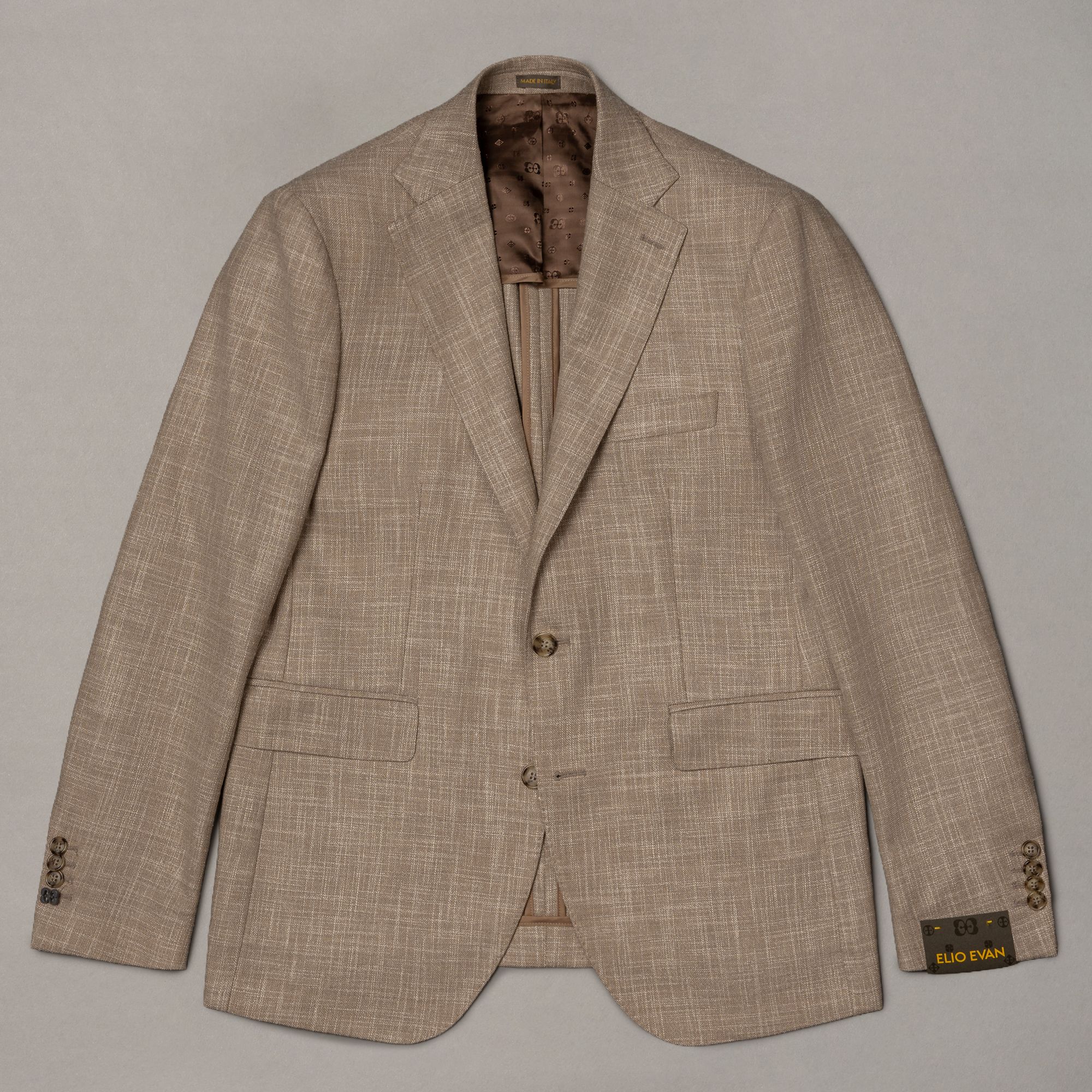 Beige wool-silk blazer with unstructured construction, made in Italy. Premium menswear with measured line from Elio Evan