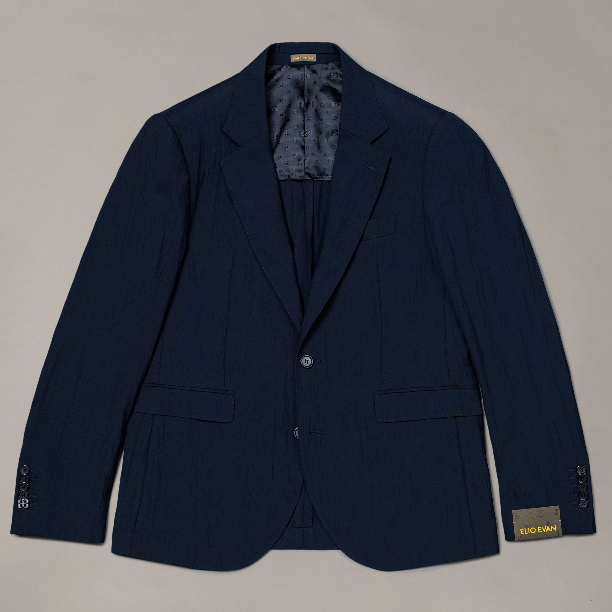Blue wool blend jacket by Elio Evan — solid design and relaxed silhouette