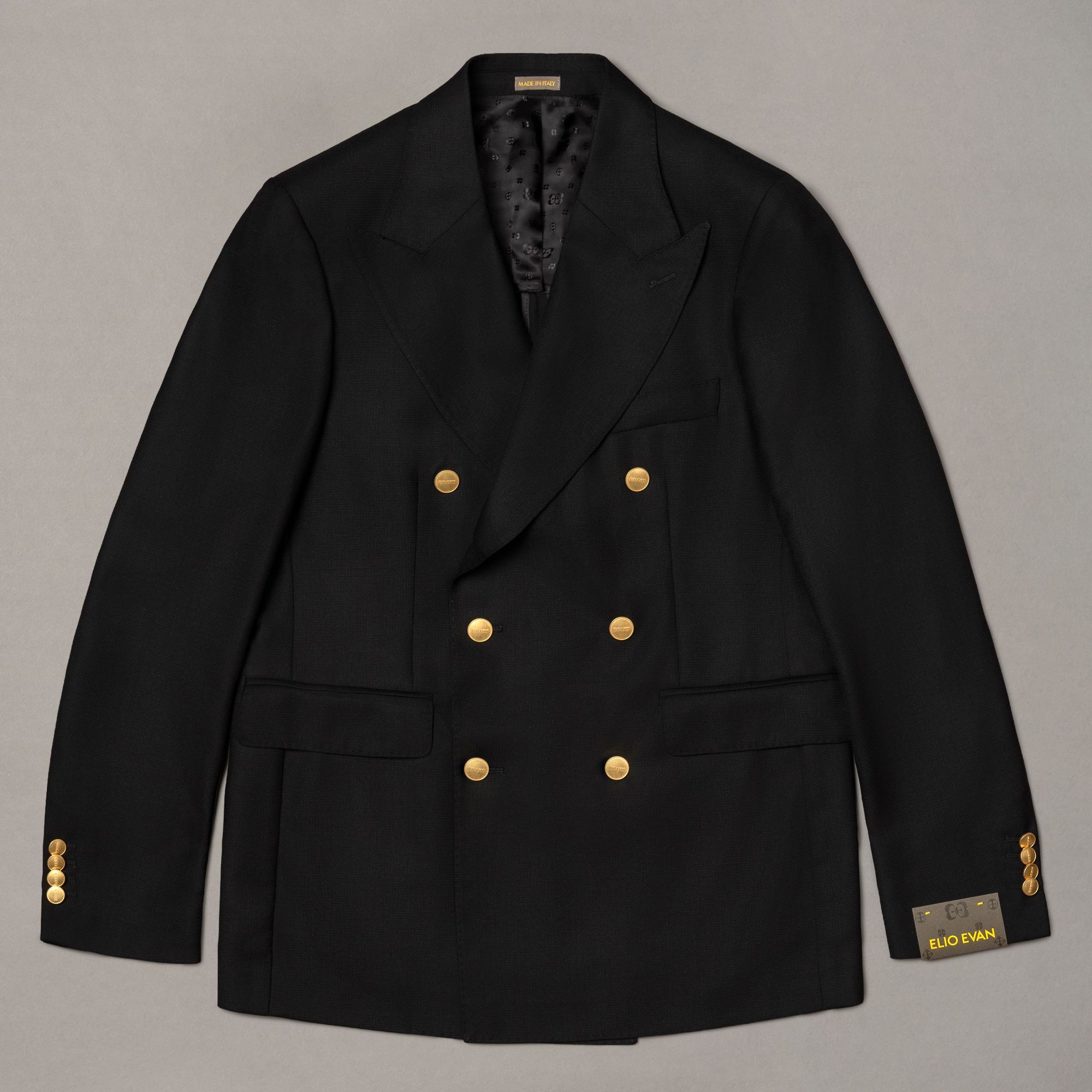 Black wool double-breasted blazer, made in Italy with a tailored fit and structured line. Premium menswear by Elio Evan.
