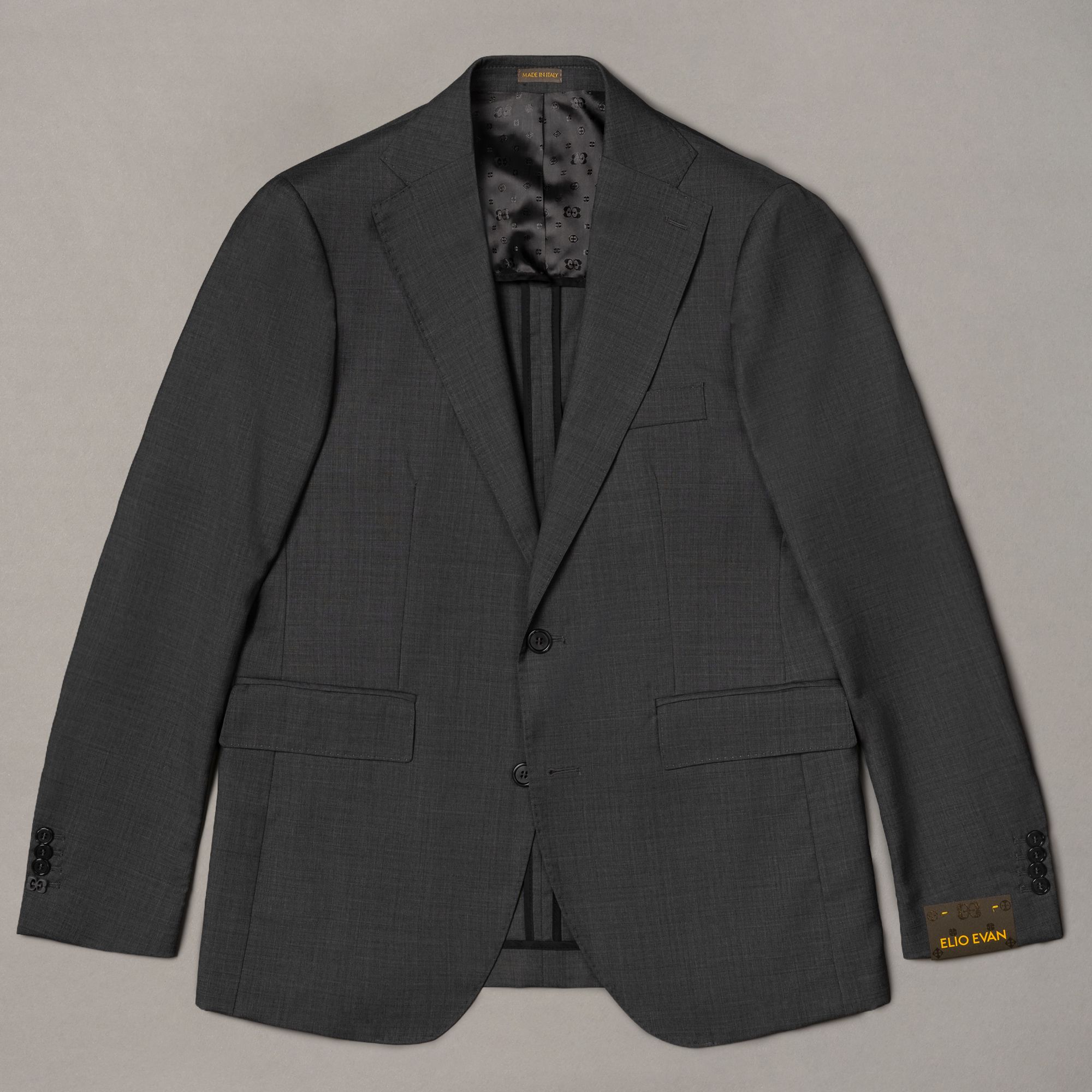 Grey wool jacket by Elio Evan — natural shoulder, two-button closure and flap pockets
