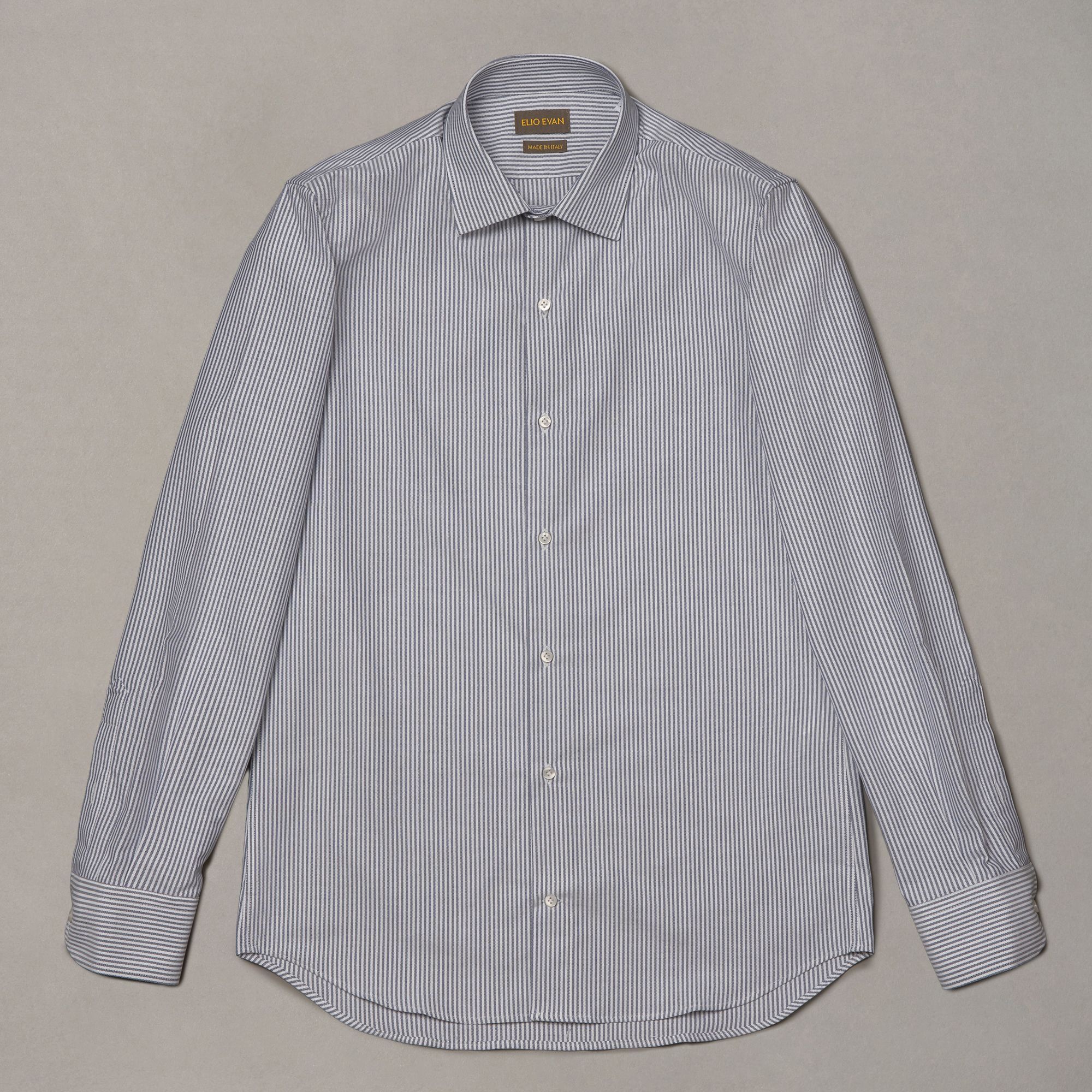 Blue striped cotton shirt by Elio Evan with a short semi-pointed collar and button cuffs