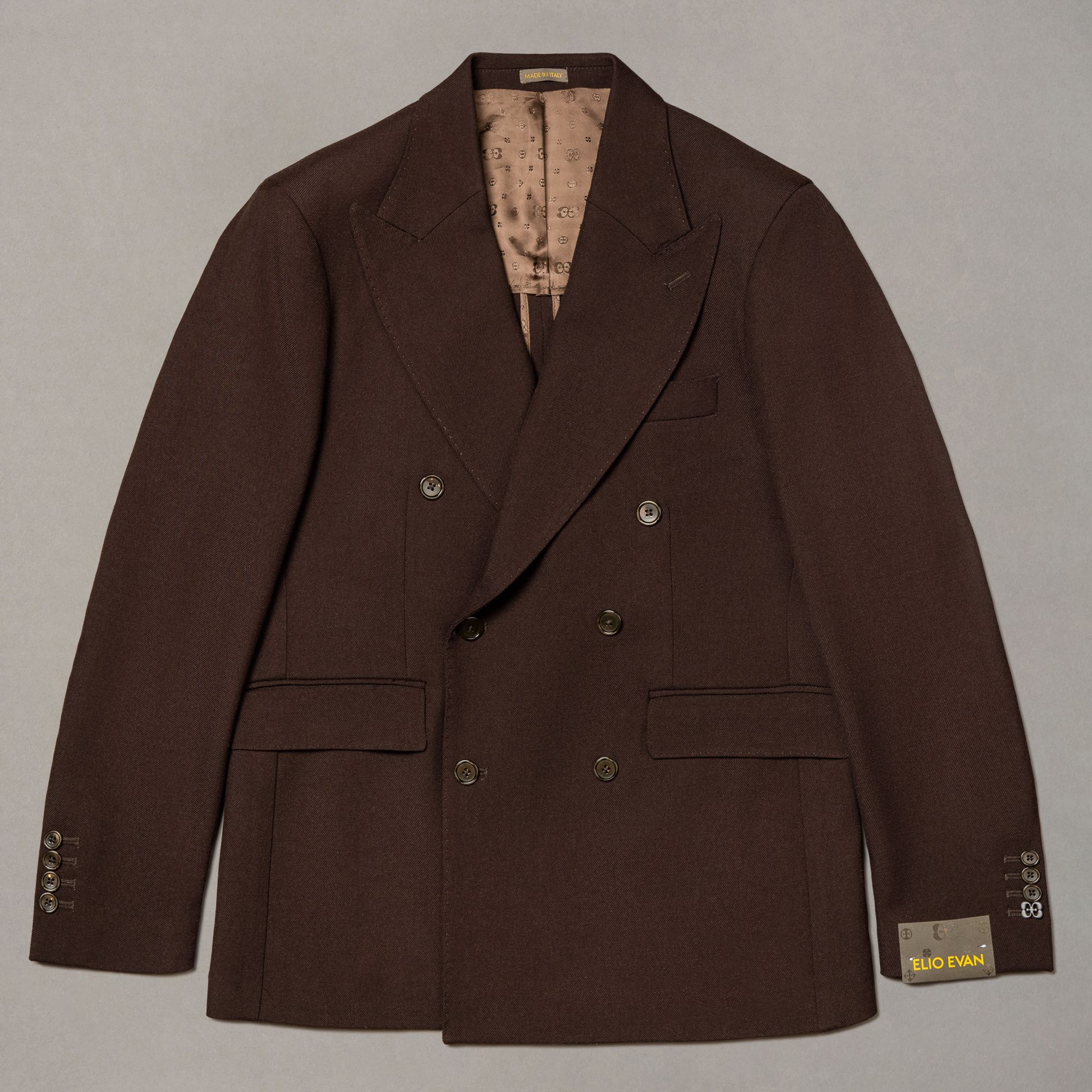 Brown wool double-breasted jacket by Elio Evan — natural shoulder and shaped waist