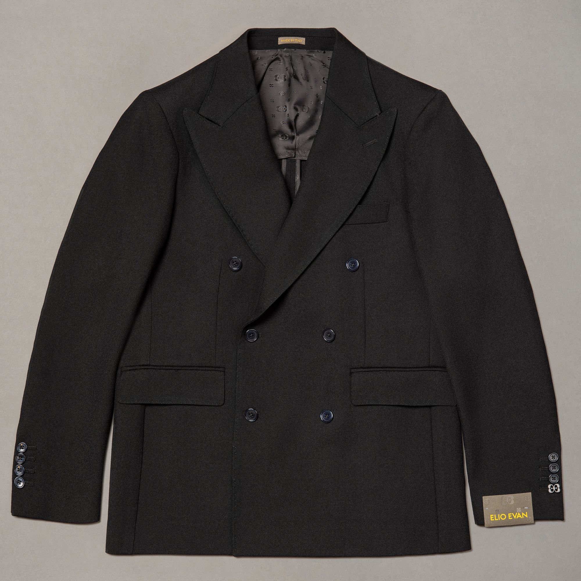 Black wool jacket by Elio Evan — double-breasted front with a shaped waist and natural shoulder