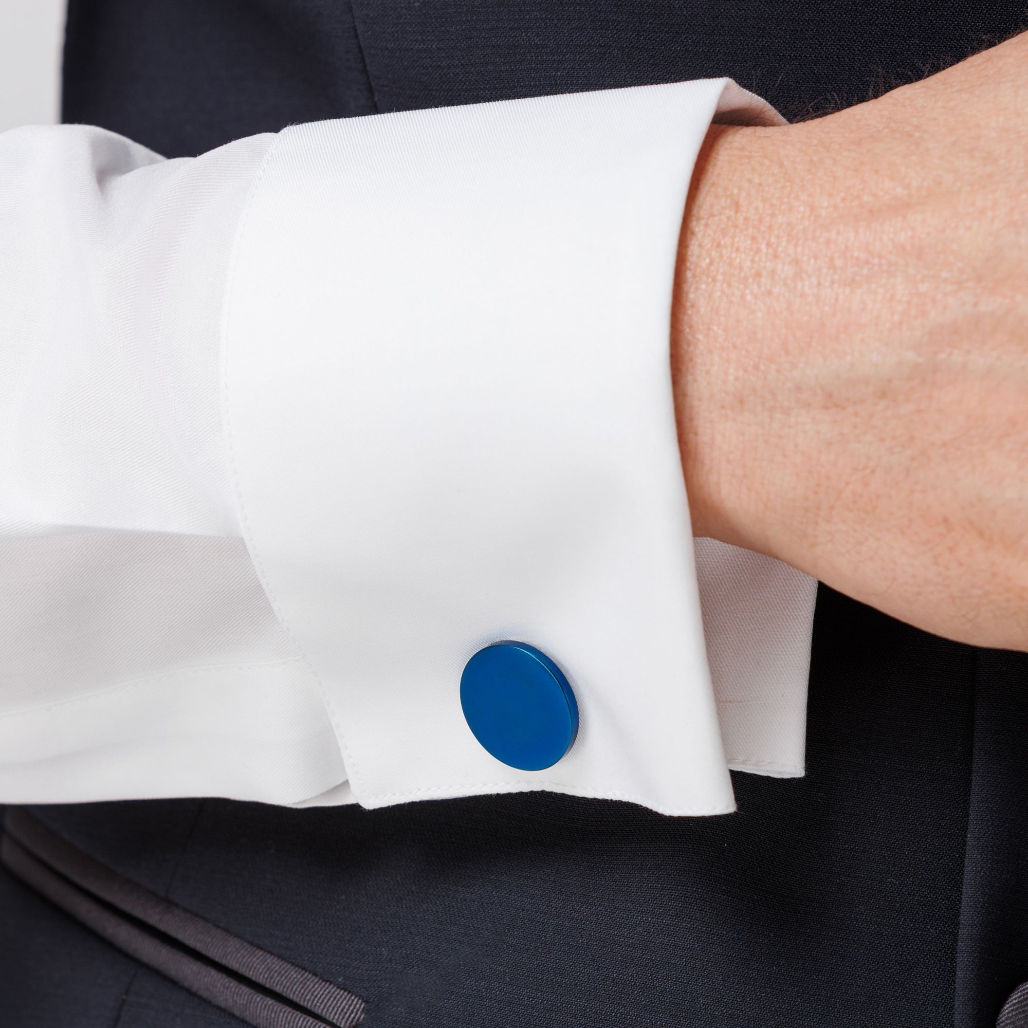 Elio Evan round blue stainless steel cufflinks with fixed back closure.