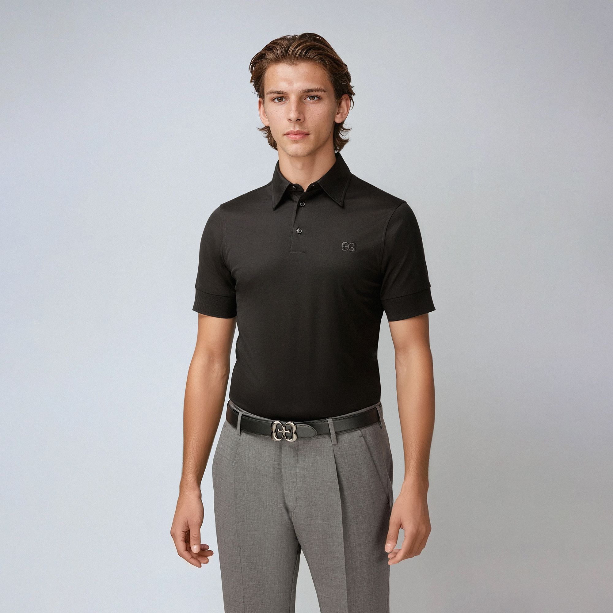 Men’s black Filoscozia polo shirt by Elio Evan, pointed collar, paramontura construction, slim fit. Made in Italy