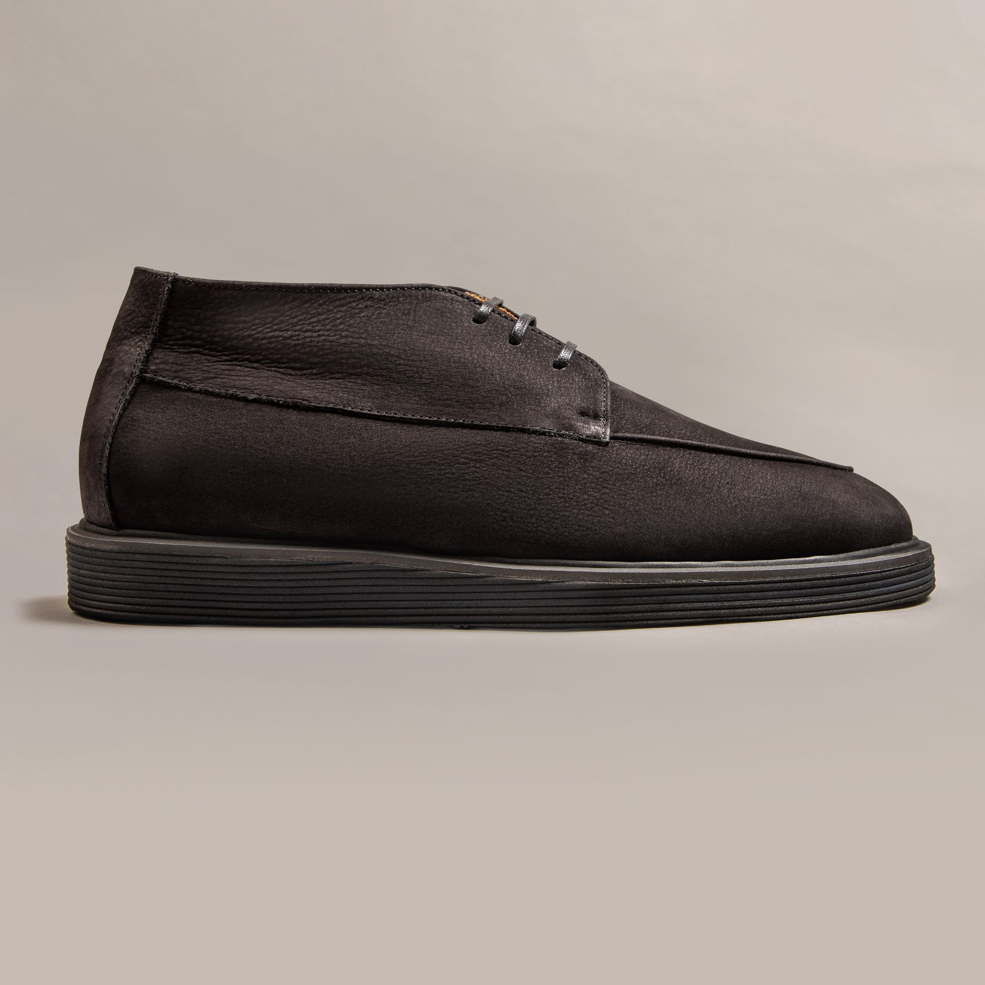Black genuine leather boots by Elio Evan — two-eyelet upper and Vibram rubber sole